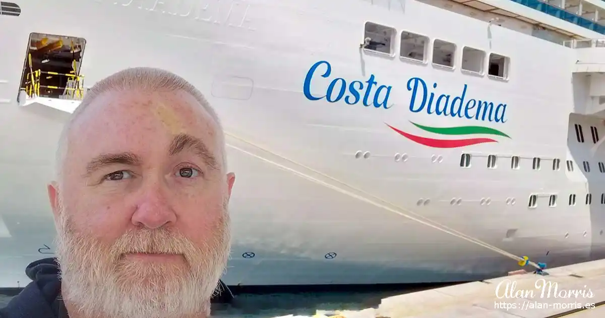 Alan Morris in front of the Costa Diadema at port in Savona, Italy.